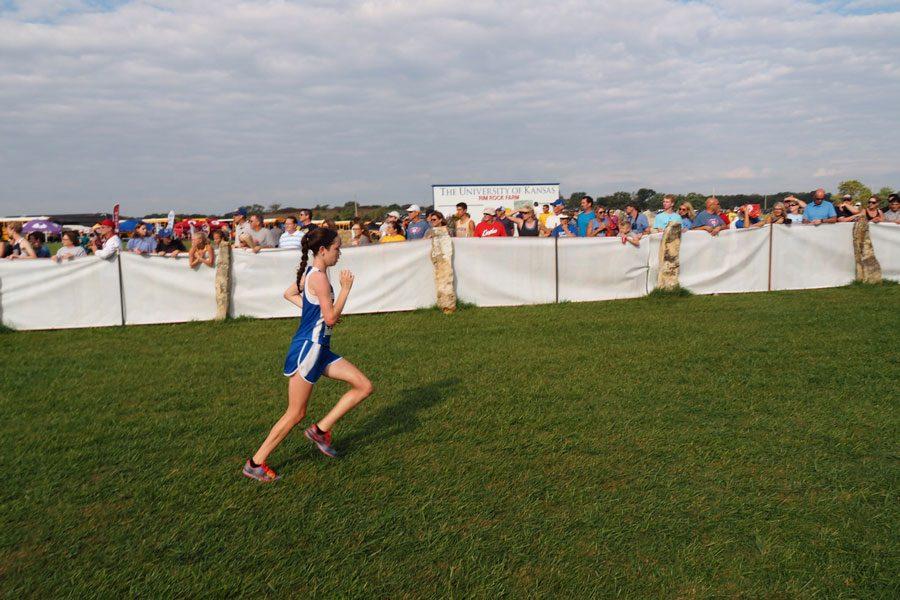 Freshman Grace Kessler races in the Rim Rock Farm Classic. Kessler finished 106th in the girls varsity gold division with a time of 21:26.