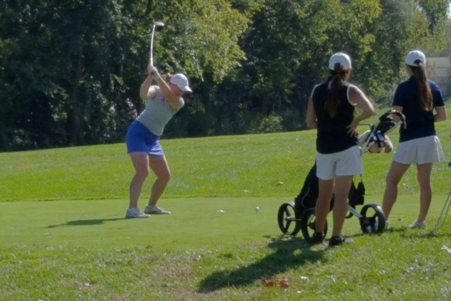 Senior Chessa McCalla prepares to hit a drive.