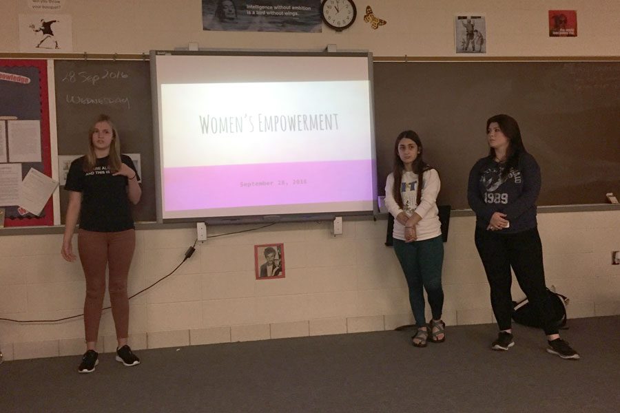 Juniors Alexis Rawlings, Izzy Rivera and Brittany Lane introduce the goals of Womens Empowerment during the first club meeting on Sept. 1. 