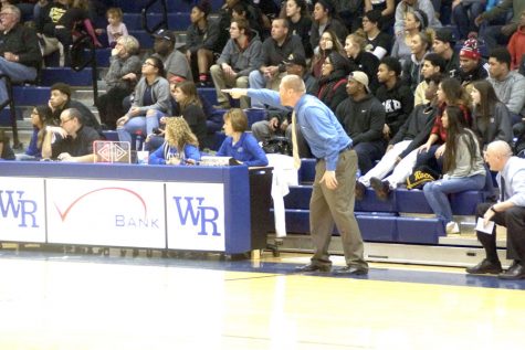 Coaches, players participate in game to raise funds for cancer research