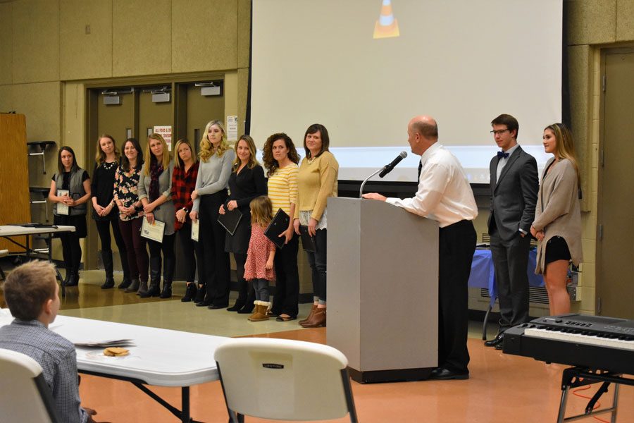 Volleyball coach Kevin Bordewick recognized the 2004 volleyball team as they were inducted into WRHS Hall of Fame on Feb. 9.