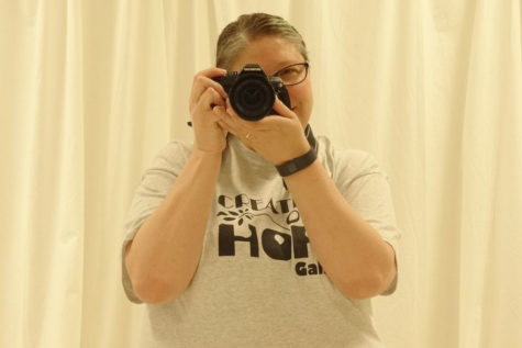 Teacher displays work in First Friday Art Walk