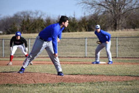 Sophomore Payton Smith prepares to throw a pitch at practice on March 16.