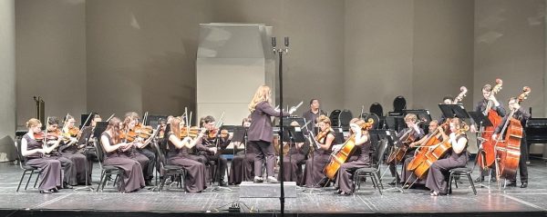 Courtney Nottingham directing the Chamber orchestra.