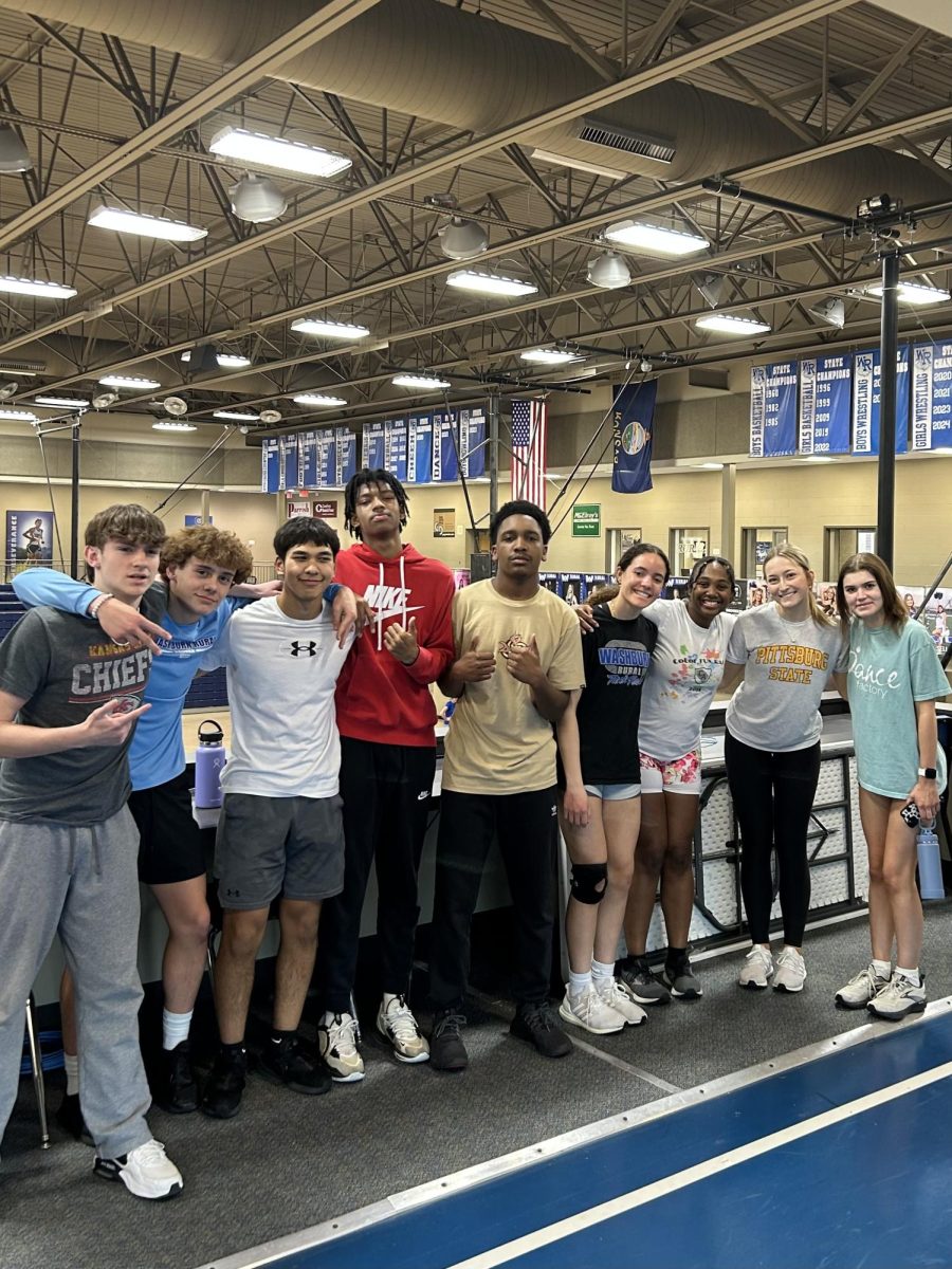 Track and Field sprinters practicing in the indoor gym