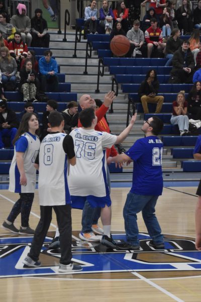 WRHS Unified teammates play basketball during the pep assembly.